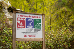 mockup of wooden sign in nature after rain.